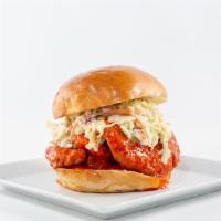 Buffalo Chicken · Crispy Chicken Breast Glazed in Buffalo Sauce, American Cheese, Home made Slaw in a  Brioche...