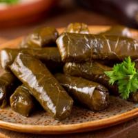 Dolmeh · Classic dolmeh made with vegetarian stuffed grape leaves filled with rice, seasoning and her...