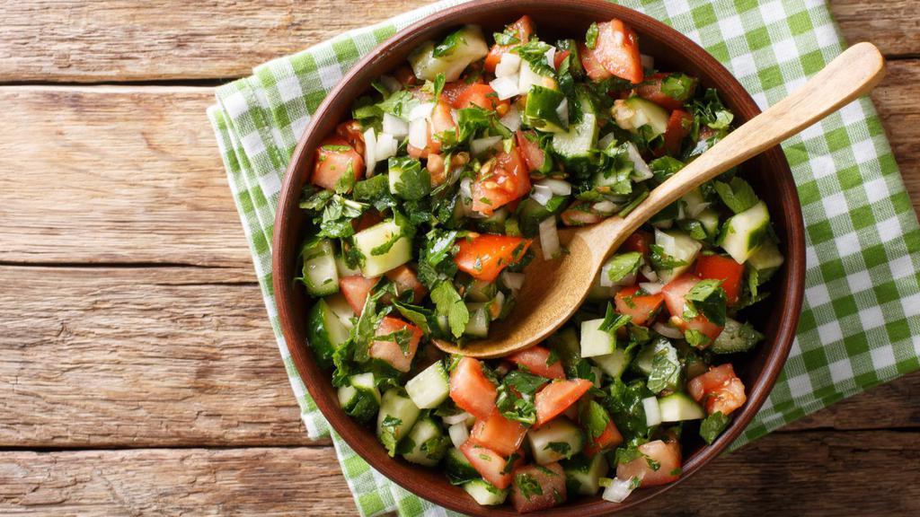 The Shirazi Salad (Mediterranean Style) · Fresh chopped cucumbers, tomatoes, onions, fresh lemon juice and olive oil dressing for exquisite taste.