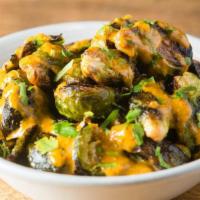 Charred Brussels Sprouts · ivan's hot sauce