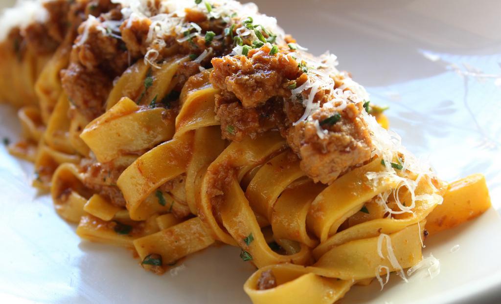 Rigatoni Bolognese · veal + pork + grana padano
