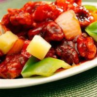 Sweet & Sour Pork/ 咕嚕肉 · Served with steamed rice.