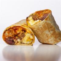 Fonz Burrito · 3 fried eggs, Italian sausage, pastrami, white American cheese, mozzarella cheese, crispy ta...