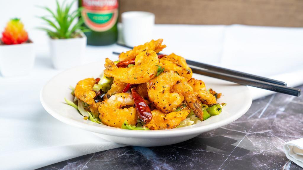 Salt & Pepper Shrimp  · 12 shrimp lightly battered and fried in tempura, then wok-fried with salt & pepper seasoning and dried chili peppers