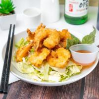 Coconut Shrimp  · Served with macaroni salad and steamed rice.
