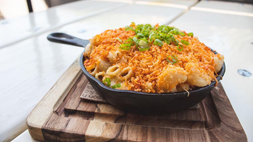 The Best Mac & Cheese · Smoked Gouda, white cheddar, and swiss, Parmesan, panko cheddar crust.