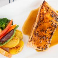 Wild Salmon Filet   · Pinot grigio, lemon, 10 years old balsamic reduction, roasted potatoes, grilled vegetables.