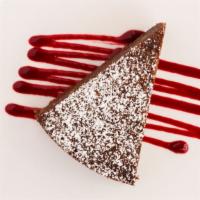Chocolate Pistachio Tort, Berry Sauce · 