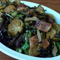 Brussel Sprout Salad · Mixed Greens, Brussel Sprouts, Roasted Garlic, Forest Mushrooms, Bacon, Lemon Parmesan Dress...