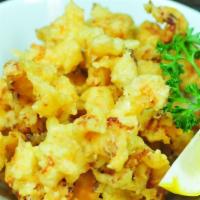 Popcorn Crawfish · Deep fried crawfish with spicy mayo, eel sauce, sweet chili, smelt egg, green onion