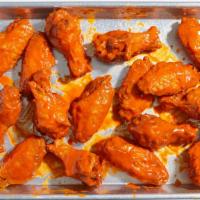 16 Wings Combo · Fried chicken wings with your choice of sauce and side.