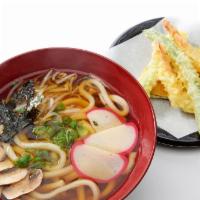 Tempura Udon Soup · Crispy mixed tempura served with udon noodles, topped with kamaboko (fish cake), mushrooms, ...