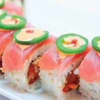 El Toro Loco · Spicy. Spicy tuna, spicy crab mix, cucumber & avocado, topped with slices of tuna, jalapeno,...