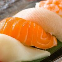Sushi Nigiri (2Pcs) · Choose from tuna, salmon, shrimp & tilapia.