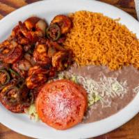 Camarones A La Diabla · Grilled shrimp, bell peppers, & onions with special chipotle sauce. Served with rice, beans,...