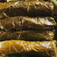 Grape Leaves 4 Pieces · Vine leaves stuffed with rice and herbs.