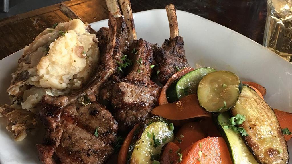 Lamb Chops · Four French cut lamb chops marinated and grilled over an open flames. Served with rice pilaf, grilled vegetables and side salad.