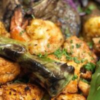 Shrimp Kabob · Grilled marinated jumbo shrimp skewered and grilled over open flames. Served with rice pilaf...