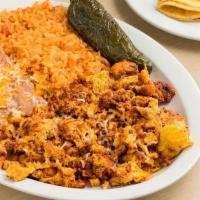 Chorizo & Eggs · Chorizo & Eggs Plate includes: . Pork Chorizo scrambled with 3 Eggs,. Rice, . Beans,. Grille...