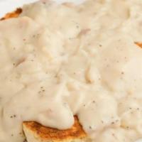 Biscuits & Gravy · Buttermilk Biscuits topped with Country Gravy.