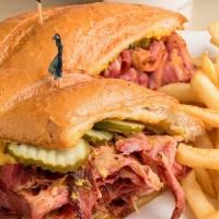 Pastrami  Sandwich · Pastrami Sandwich Includes:. Pastrami. Mustard . Pickles. on a Kaiser Bread Roll