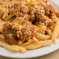 Chili Cheese Fries · Chili Cheese Fries include:. Homemade Chili,. Crispy Fries,. Shredded Monterey Jack and Ched...