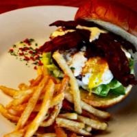 Spicy Burger · Our grass fed beef patty cooked to your desired 
 temperature,topped with with lettuce, toma...