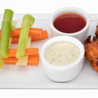 Buffalo Wings · Classic Chicken Wings with our House Made Wing Sauce