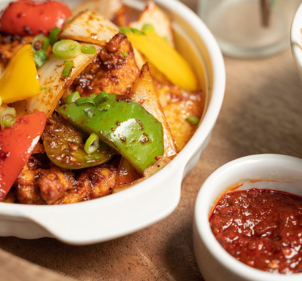 Chilli Paneer · Paneer (Indian Cottage Cheese) cooked in a wok with a blend of Indian spices and Chinese spices, mildly simmered in soy sauce.