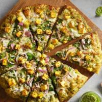 Saag Chicken Pizza · Chicken on top of Classic Indian Saag (Spinach and Mustard Greens) sauce.