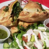 Paneer Tikka Calzone · Italian Meets Indian,  Classic Calzone with a touch of Indian, Tandoor cooked Paneer with ti...