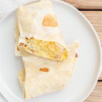 Bacon & Eggs Burrito  · Bacon, egg, Rice, beans and cheese.
Add potato no extra charge
