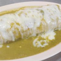 Wet Burrito  · Choice of meat rice and beans lettuce cheese and sour cream choice of red or green sauce.