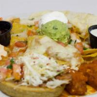 Sample Platter · Each platter includes a selections of quesadillas, taquitos, chicken wings, sope, and cheese...