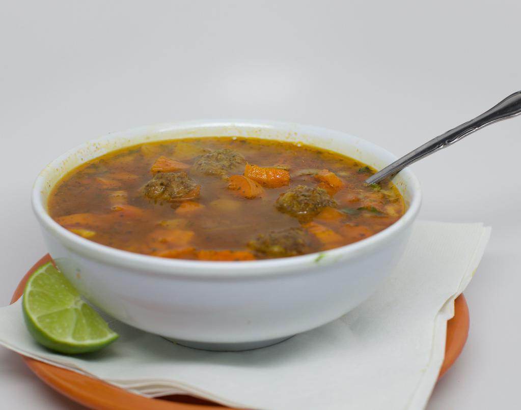 Albondigas Soup · Delicious Mexican soup made with homemade minted pork meatballs and seasonal vegetables in a clear broth.