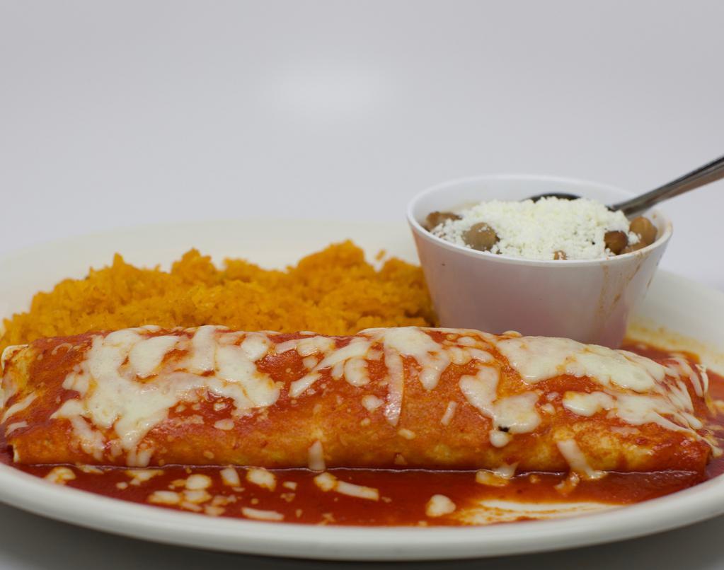 Burrito A La Diabla · Your choice of chicken, ground beef or picadillo stuffed into a flour tortilla. Topped with jack cheese and a spicy a la diabla sauce. Served with rice and beans on the side.