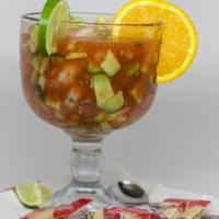 Cocktail De Camarones · Prawns, cucumbers, pico de gallo and avocado served cold in a delicious tomato juice.