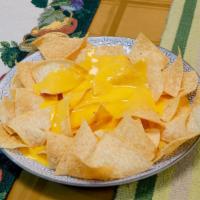 Nachos With Cheese · Thin style chips with nacho cheese. Comes with fresh salsa on the side.