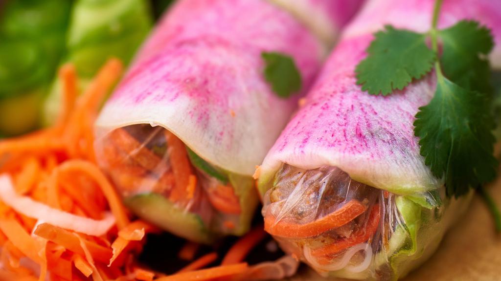 Fresh Rolls · Your choice of protein or not, rolled with pickled carrots & daikon, lettuce, cucumber, cilantro, rice noodles, and crispy onion wrapped in rice paper. Served with mom's peanut sauce!
contains peanuts
