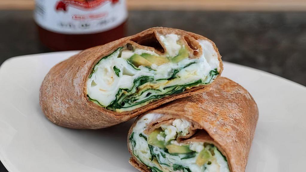 Jenna'S Wrap · Egg whites, avocado, feta cheese, and grilled spinach in a wheat tortilla. Served with your choice of fruit or mixed greens.