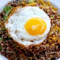 Nicole'S Quinoa Bowl · Quinoa, with sautéed broccoli, mushrooms, melted Cheddar cheese. Topped with a sunny side up...