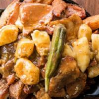 Pork Belly Poutine · Started as a gumbo but finished as a gravy with the addition of Cream , sliced pork belly, c...