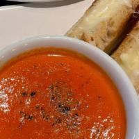 Heirloom Tomato Bisque · -Roasted heirloom tomatoes and sweet onions pureed with herbs & a hint of. cream. -served wi...
