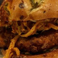 Crispy Fried Chicken Sandwich · Crispy fried chicken, spicy slaw, jalapeno cheddar bun, pickles