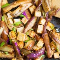 Eggplant With Tofu · Chinese eggplant with fried tofu and green onions, stir-fried in spicy szechuan sauce.