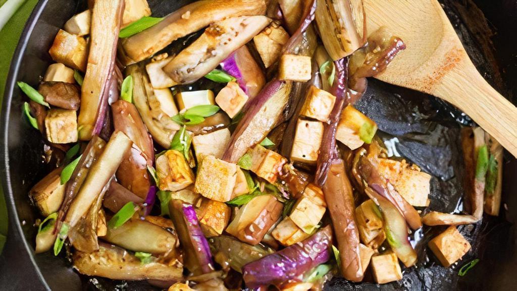 Eggplant With Tofu · Chinese eggplant with fried tofu and green onions, stir-fried in spicy szechuan sauce.