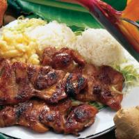 Hawaiian Bbq Chicken · Grilled BBQ chicken served atop a bed of cabbage along with sides of rice and macaroni salad.