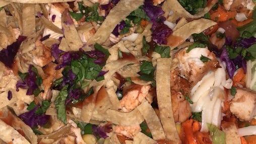 Fresh Bbq Salmon Salad · One size only. Mixed green lettuce, mesquite grilled fresh bbq salmon, tomatoes, black beans, cut corn, carrots, red cabbage, cilantro and tortilla chips.