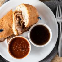 French Dip Sandwich · Served on a french roll with a choice of side dish.