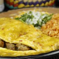 Chile Verde Omelette · Pork chunks, green chile, rice & beans, and tortillas.